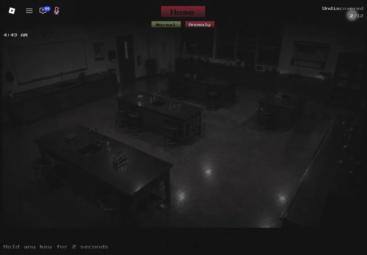 Science Lab camera feed in The School with the report interface open — Normal and Anomaly buttons under the Home button, an Undiscovered 2/12 counter top-right, and the Hold any key prompt at the bottom